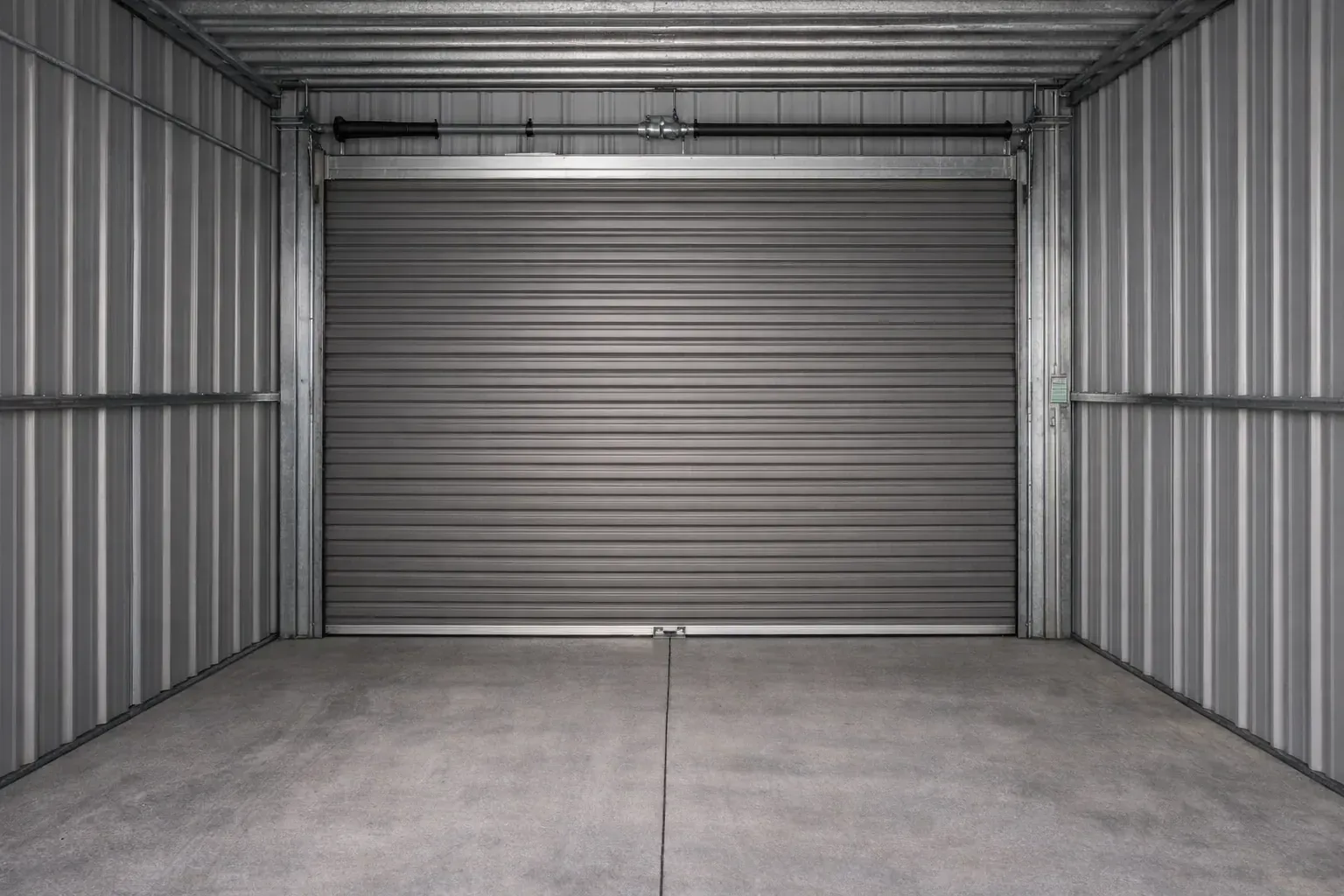 Garage door style example with ribbed steel panels